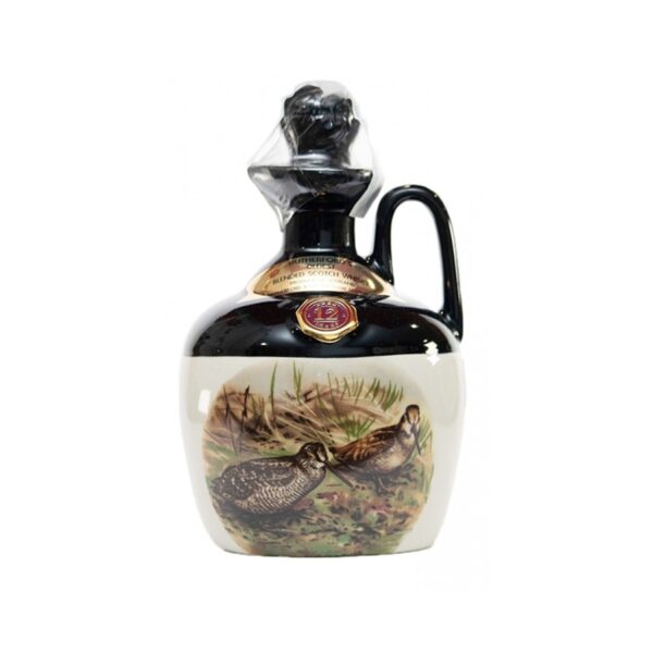 Botella Rutherford’s 12 Años Caneco – Vino espumoso de 12 años con burbujas finas y aromas complejos.